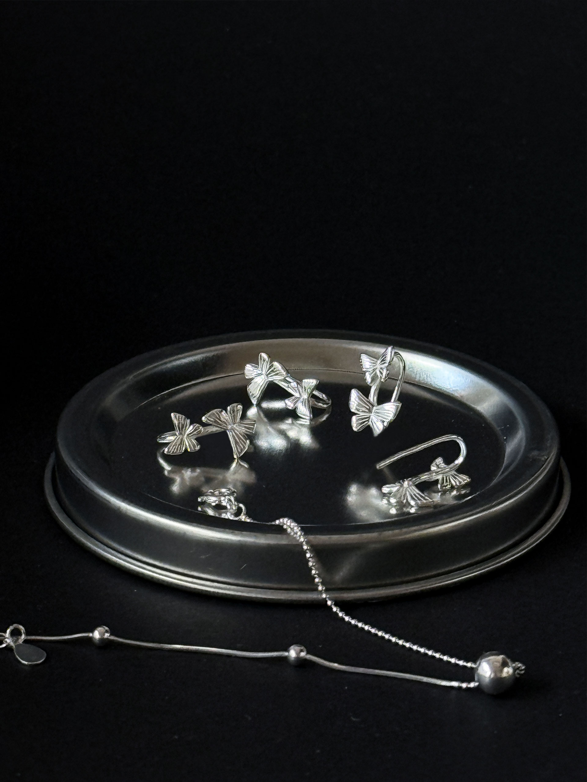 Still life - Butterfly Earring texture detail